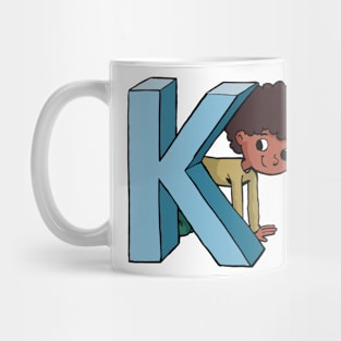 boy is hiding behind the capital letter K Mug